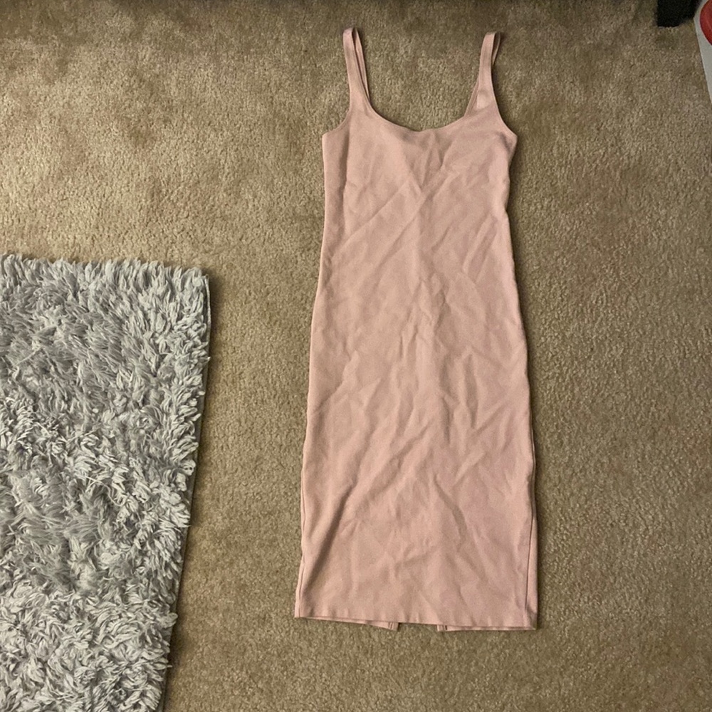 Pink body on dress with slit in the back